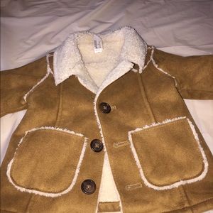 Baby’s brown jacket